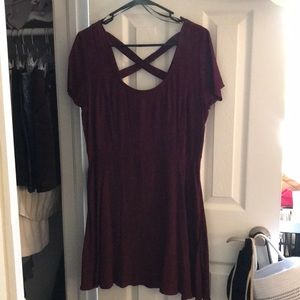Burgundy, knee length summer dress with criss cross design on the back.